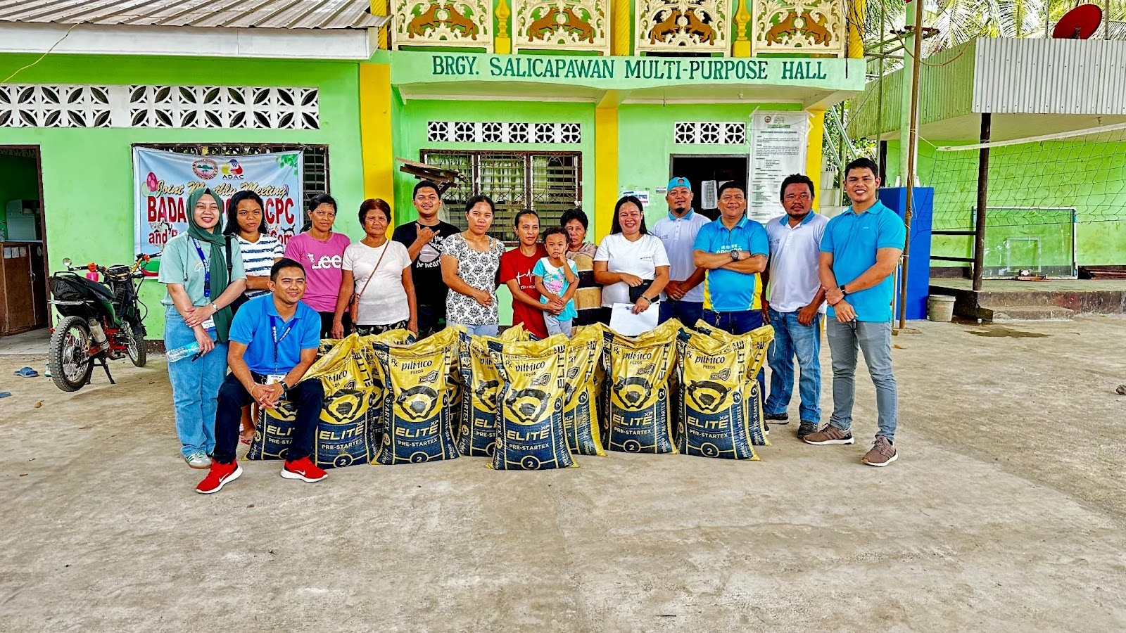 Hog farmers with Pilmico and DSWD partners