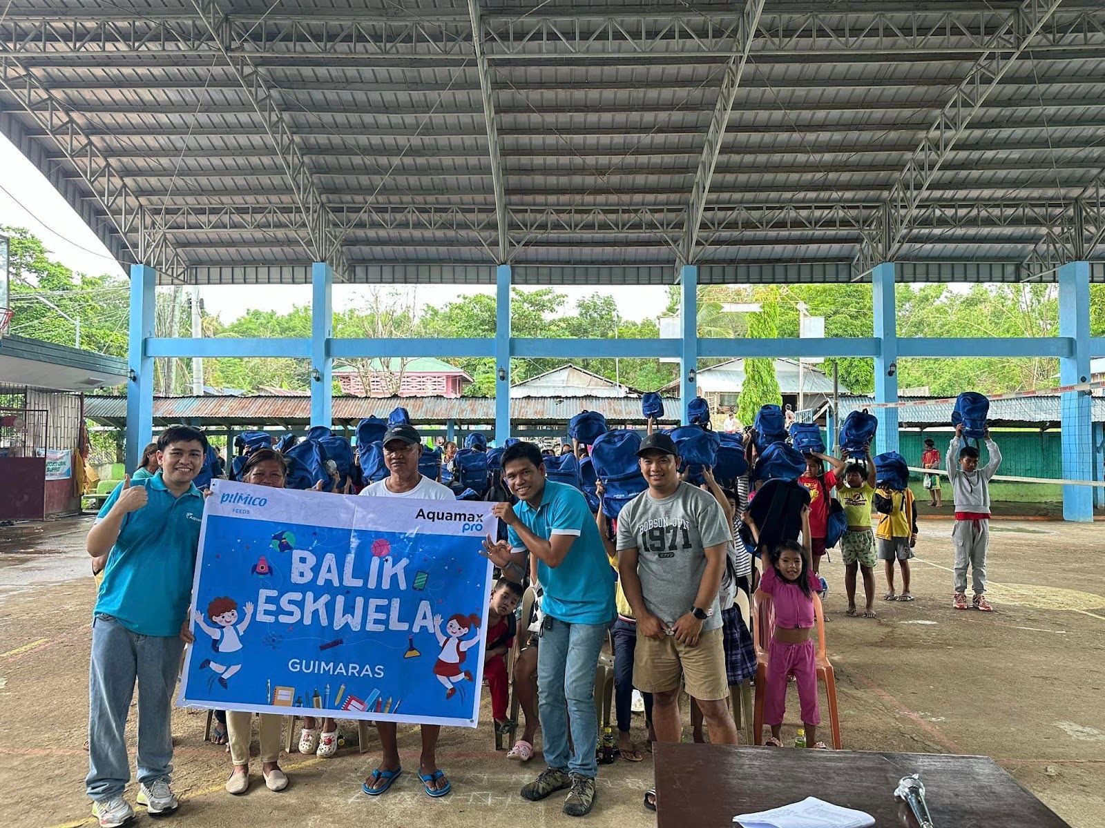 Pilmico participants in Balik Eskwela with beneficiaries